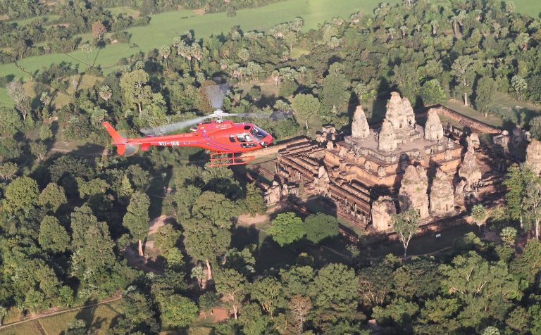 Helicopter over Angkor Wat Cambodia